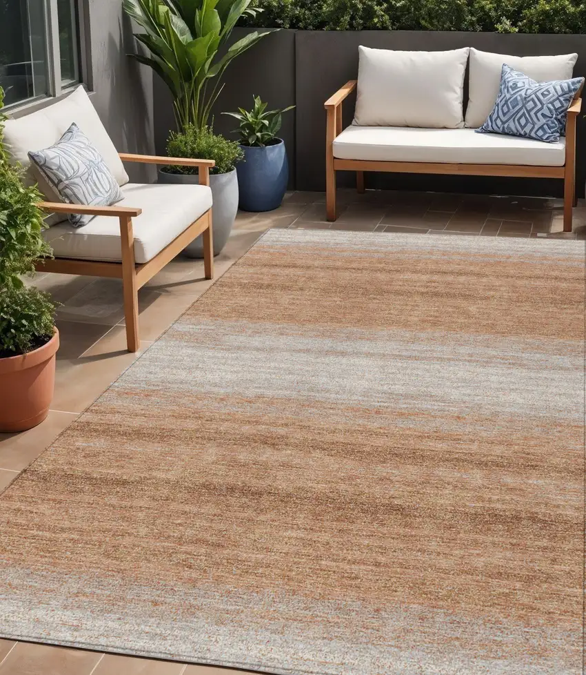 Copper And Beige Striped Washable Indoor Outdoor Area Rug Photo 1