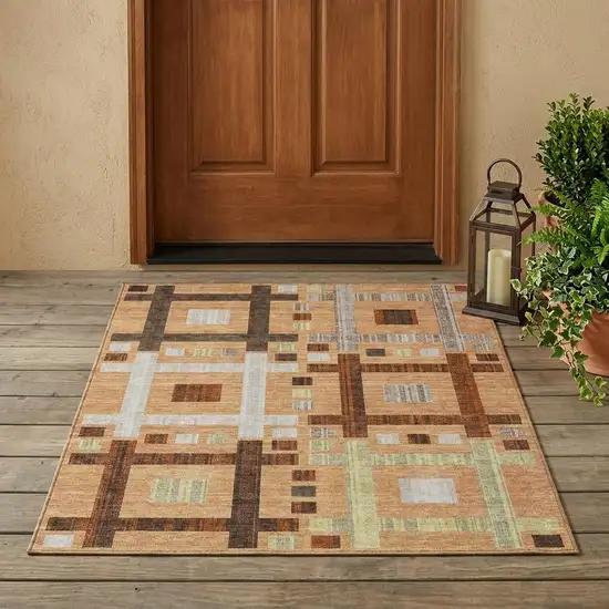 Copper And Brown Geometric Washable Indoor Outdoor Area Rug Photo 1