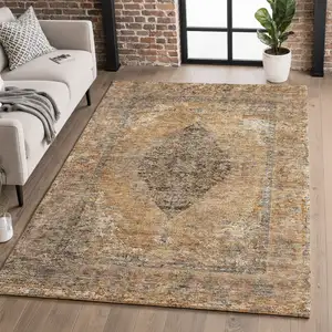 Photo of Copper And Brown Medallion Washable Area Rug With UV Protection