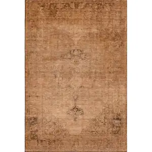Photo of Copper And Brown Oriental Washable Area Rug With UV Protection