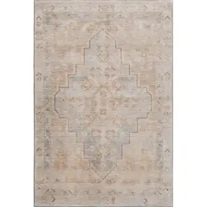 Photo of Copper And Gray Medallion Washable Area Rug With UV Protection