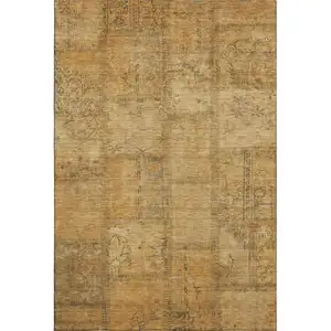 Photo of Copper And Gray Patchwork Washable Area Rug With UV Protection