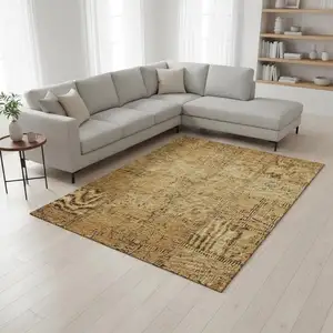 Photo of Copper And Gray Patchwork Washable Area Rug With UV Protection