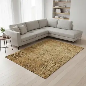 Photo of Copper And Gray Patchwork Washable Area Rug With UV Protection