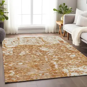 Photo of Copper And Ivory Abstract Washable Area Rug With UV Protection