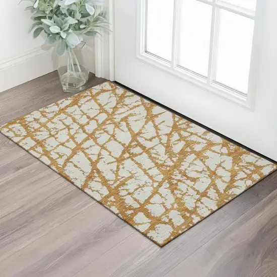 Copper And Ivory Abstract Washable Area Rug With UV Protection Photo 2