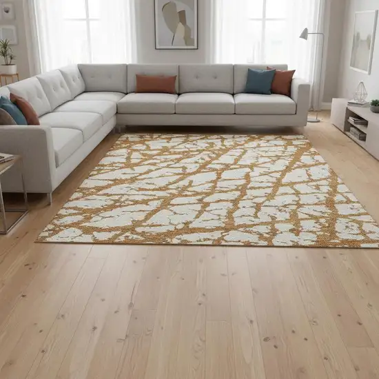 Copper And Ivory Abstract Washable Area Rug With UV Protection Photo 2