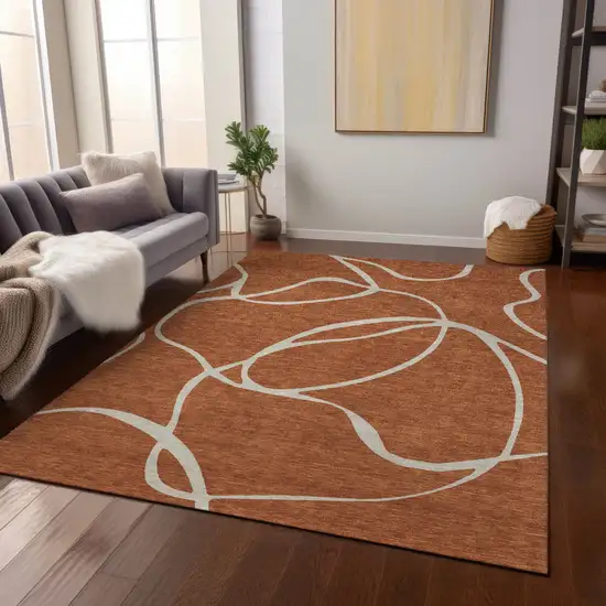 Copper And Ivory Abstract Washable Indoor Outdoor Area Rug Photo 9