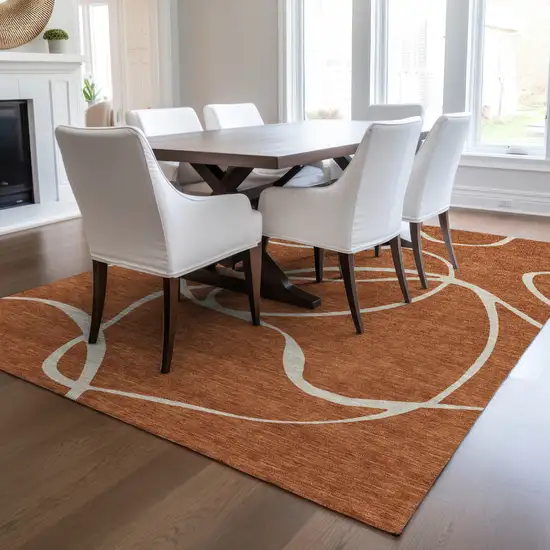 Copper And Ivory Abstract Washable Indoor Outdoor Area Rug Photo 9