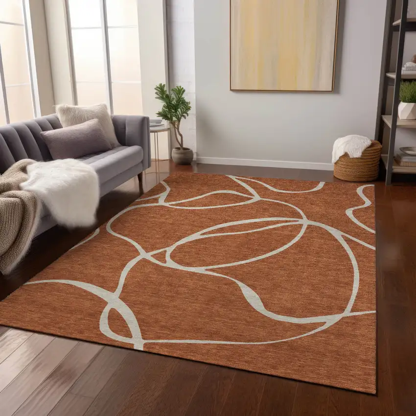 Copper And Ivory Abstract Washable Indoor Outdoor Area Rug Photo 9