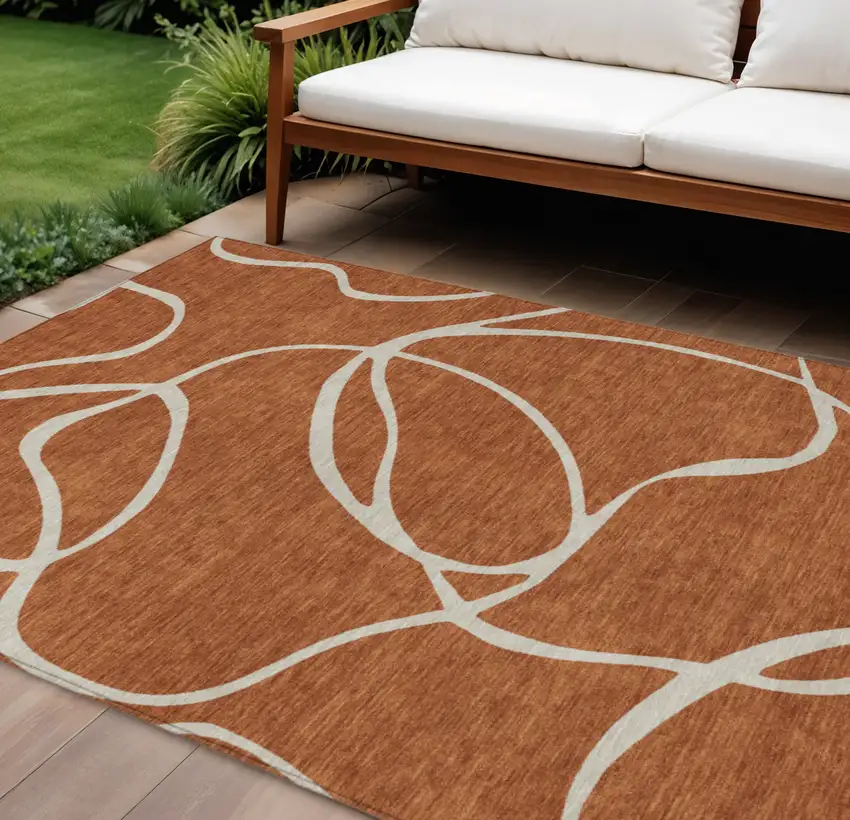 Copper And Ivory Abstract Washable Indoor Outdoor Area Rug Photo 1