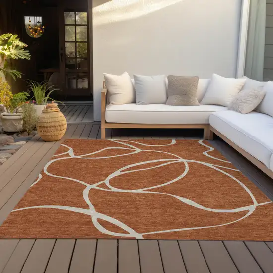 Copper And Ivory Abstract Washable Indoor Outdoor Area Rug Photo 8