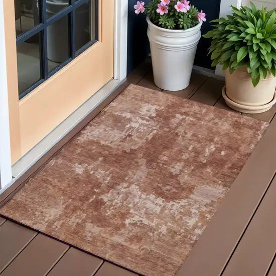 Copper And Ivory Abstract Washable Indoor Outdoor Area Rug Photo 1