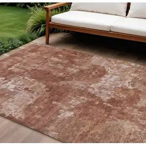 Photo of Copper And Ivory Abstract Washable Indoor Outdoor Area Rug