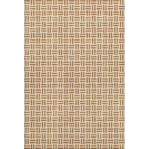 Photo of Copper And Ivory Geometric Washable Area Rug With UV Protection