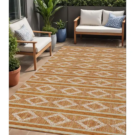 Copper And Ivory Geometric Washable Indoor Outdoor Area Rug Photo 1