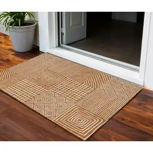 Photo of Copper And Ivory Geometric Washable Indoor Outdoor Area Rug