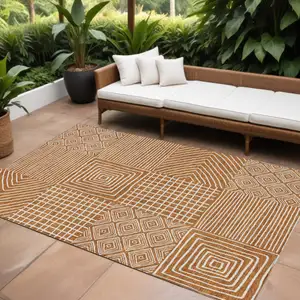 Photo of Copper And Ivory Geometric Washable Indoor Outdoor Area Rug