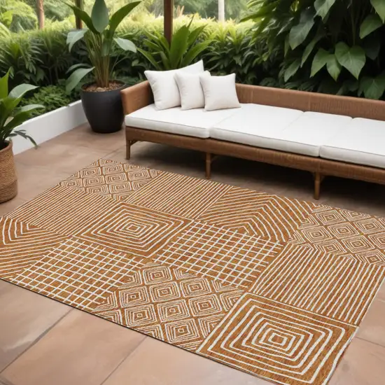 Copper And Ivory Geometric Washable Indoor Outdoor Area Rug Photo 1