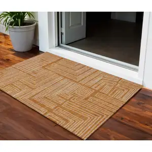 Photo of Copper And Ivory Geometric Washable Indoor Outdoor Area Rug