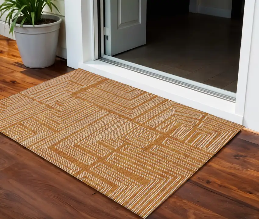Copper And Ivory Geometric Washable Indoor Outdoor Area Rug Photo 1