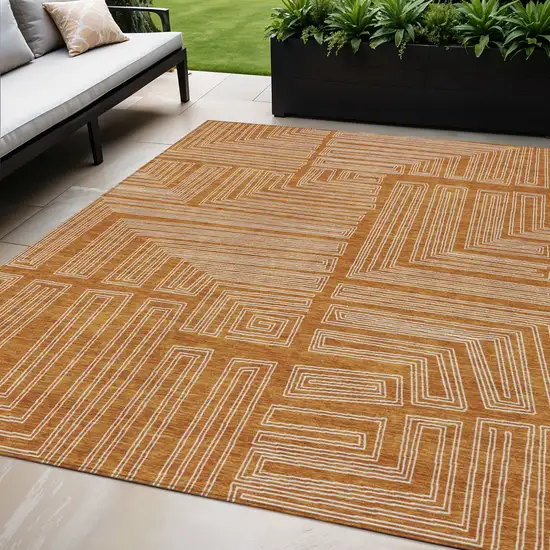 Copper And Ivory Geometric Washable Indoor Outdoor Area Rug Photo 1
