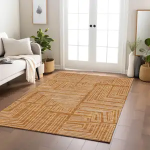 Photo of Copper And Ivory Geometric Washable Indoor Outdoor Area Rug