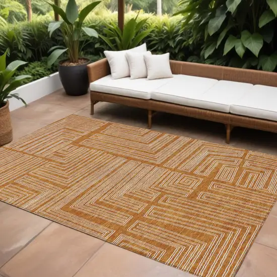 Copper And Ivory Geometric Washable Indoor Outdoor Area Rug Photo 1