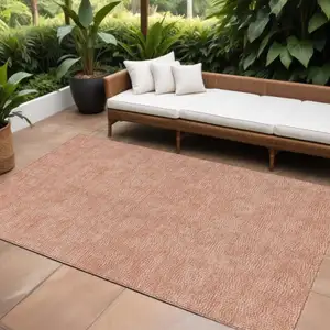 Photo of Copper And Ivory Geometric Washable Indoor Outdoor Area Rug