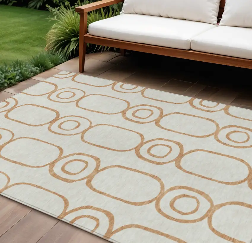 Copper And Ivory Geometric Washable Indoor Outdoor Area Rug Photo 1