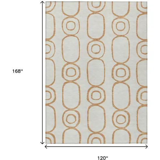 Copper And Ivory Geometric Washable Indoor Outdoor Area Rug Photo 7