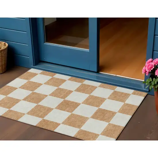 Copper And Ivory Geometric Washable Indoor Outdoor Area Rug Photo 1