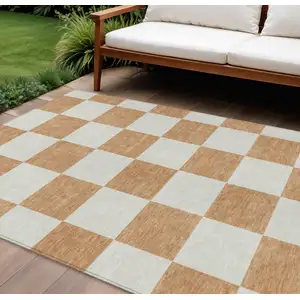 Photo of Copper And Ivory Geometric Washable Indoor Outdoor Area Rug
