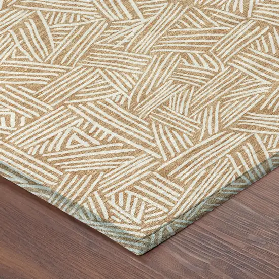 Copper And Ivory Geometric Washable Indoor Outdoor Area Rug Photo 7