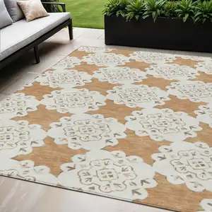 Photo of Copper And Ivory Quatrefoil Washable Indoor Outdoor Area Rug