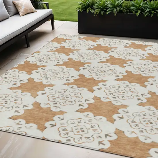 Copper And Ivory Quatrefoil Washable Indoor Outdoor Area Rug Photo 1