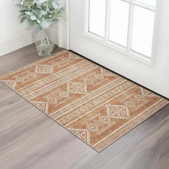 Copper And Ivory Southwestern Washable Area Rug With UV Protection Photo 1