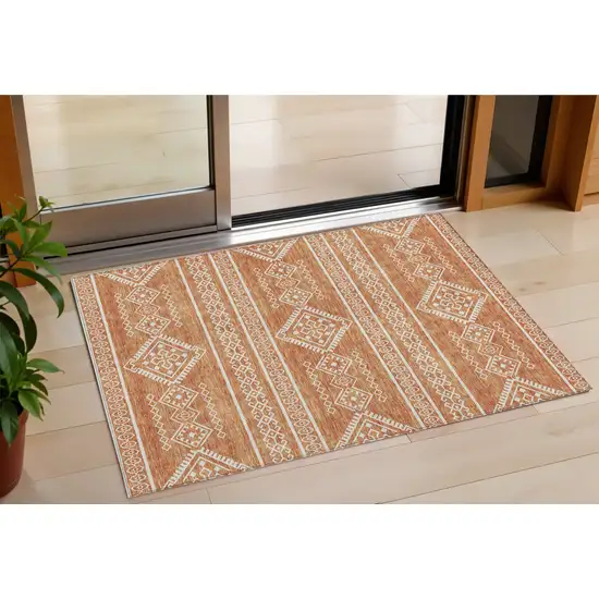 Copper And Ivory Southwestern Washable Indoor Outdoor Area Rug Photo 1