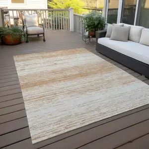 Photo of Copper And Ivory Striped Washable Indoor Outdoor Area Rug