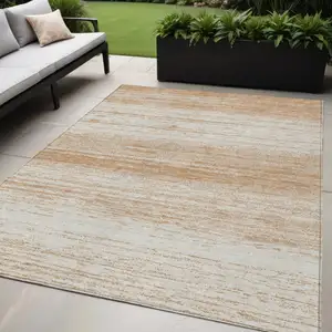 Photo of Copper And Ivory Striped Washable Indoor Outdoor Area Rug
