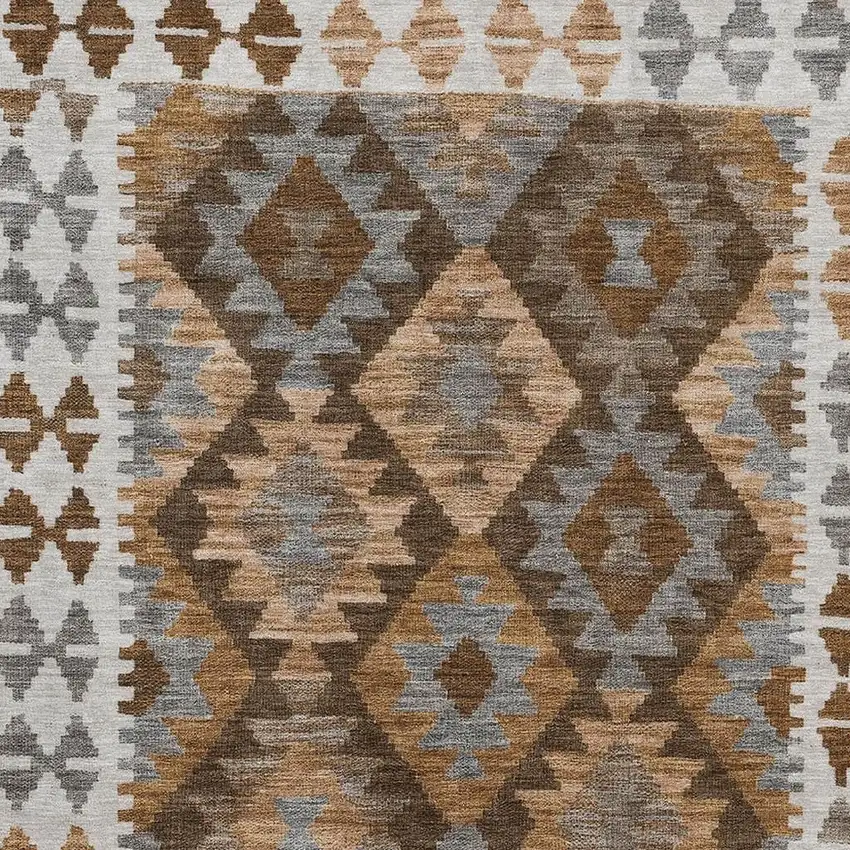 Copper And Ivory Tribal Washable Area Rug With UV Protection Photo 3