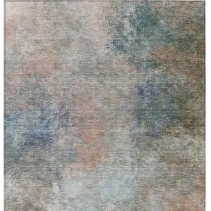 Photo of Copper And Navy Blue Abstract Washable Indoor Outdoor Area Rug