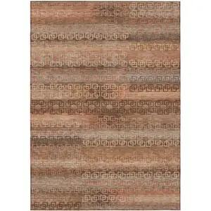Photo of Copper And Peach Striped Washable Indoor Outdoor Area Rug