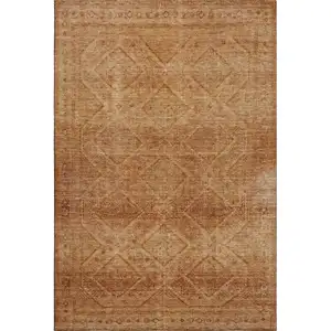 Photo of Copper And Rust Geometric Washable Area Rug With UV Protection