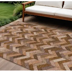Photo of Copper And Rust Geometric Washable Indoor Outdoor Area Rug