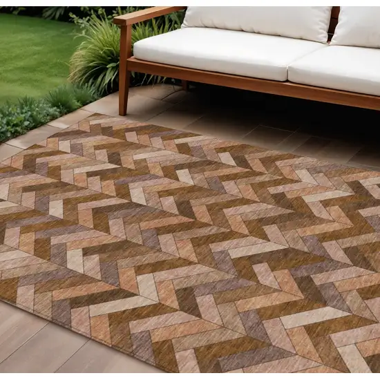 Copper And Rust Geometric Washable Indoor Outdoor Area Rug Photo 1
