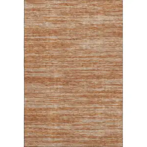 Photo of Copper And Rust Striped Washable Area Rug With UV Protection