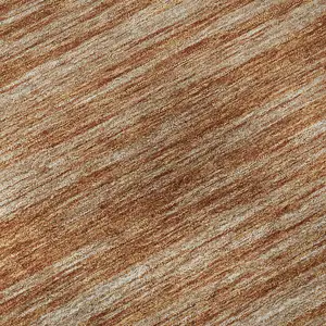 Photo of Copper And Rust Striped Washable Area Rug With UV Protection
