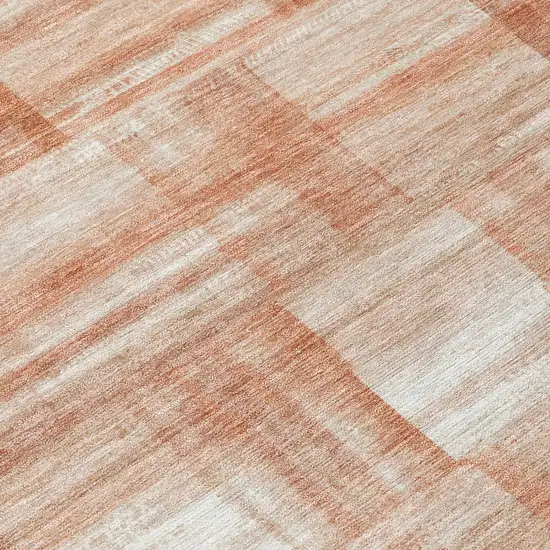 Copper And Salmon Striped Washable Indoor Outdoor Area Rug Photo 6