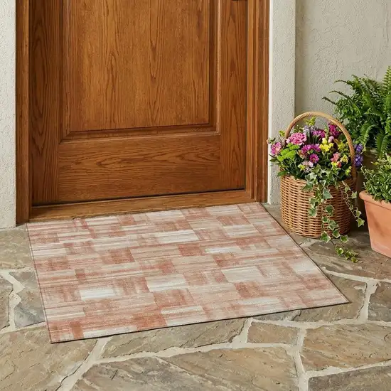 Copper And Salmon Striped Washable Indoor Outdoor Area Rug Photo 1